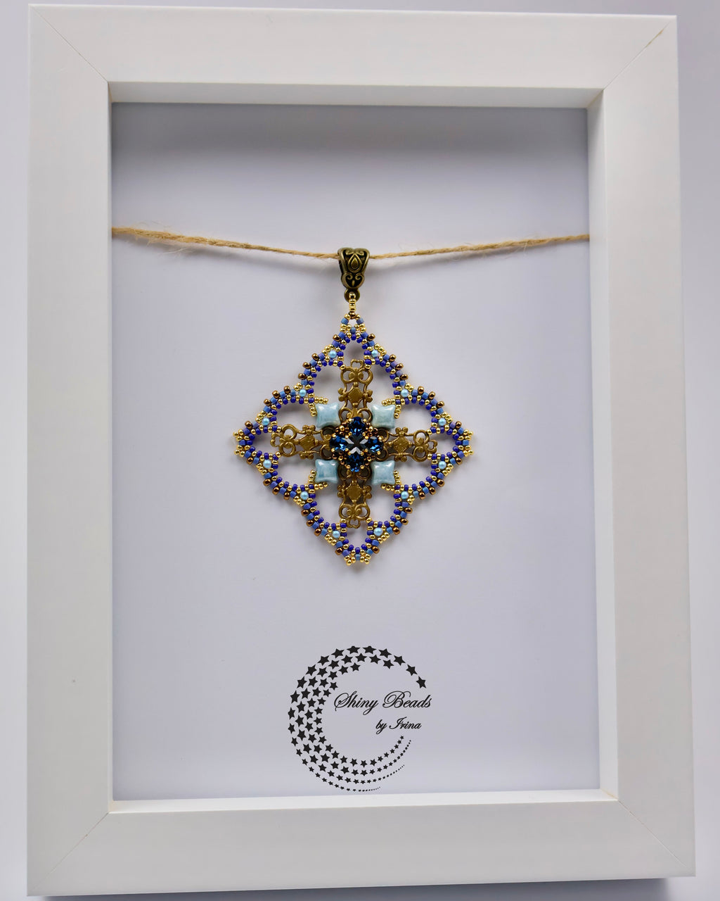 "QUATERFOIL WINDOW" PENDANT