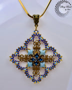"QUATERFOIL WINDOW" PENDANT
